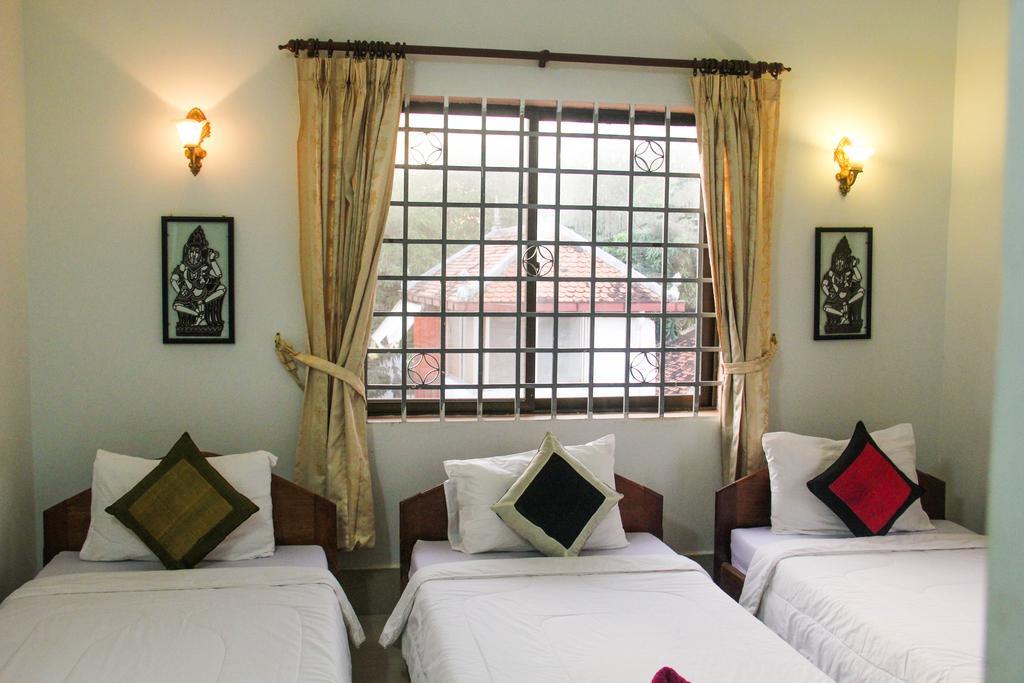 Tropical Breeze Otel Siem Reap Oda fotoğraf